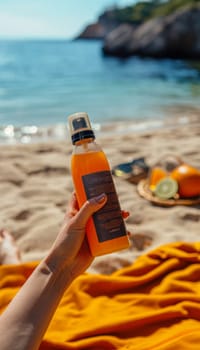 A hand holds a sunscreen bottle in the foreground, with the vibrant blue ocean, rocky cliffs, and lush greenery of a tropical beach scene framing the image