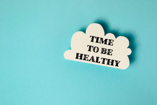 A cloud with the words Time to be healthy written on it. Concept of motivation and encouragement to prioritize one's health and well-being