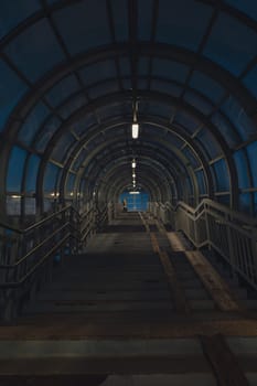 A pedestrian crossing at sunset. Tunnel Shot using a wide angle lens