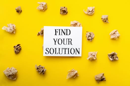 A yellow background with a white sign that says find your solution. The sign is surrounded by shredded paper