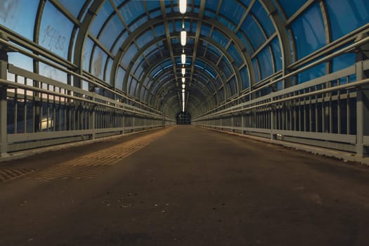 A pedestrian crossing at sunset. Tunnel Shot using a wide angle lens