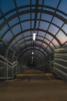 A pedestrian crossing at sunset. Tunnel Shot using a wide angle lens