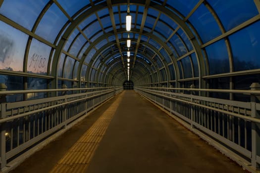A pedestrian crossing at sunset. Tunnel Shot using a wide angle lens