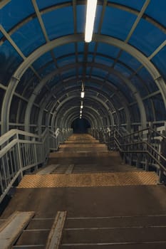 A pedestrian crossing at sunset. Tunnel Shot using a wide angle lens