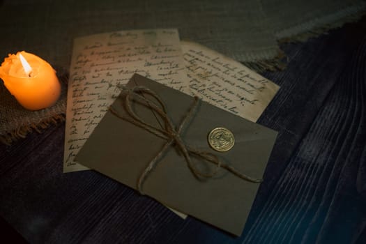 An antique envelope and a letter on the table. High quality photo