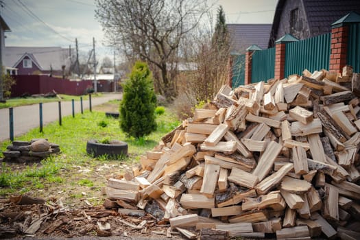 A mountain of harvested firewood. High quality photo