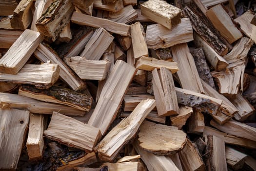 A mountain of harvested firewood. High quality photo