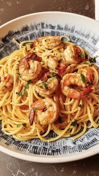 Pasta with shrimps, tomatoes and basil on a plate