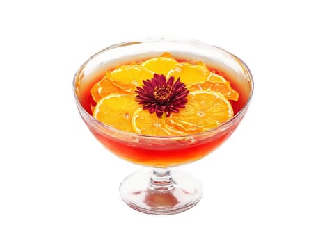 Scorpion A large bowl with layered orange and red liquid floating fruit slices and flowers. Drink isolated on transparent background.