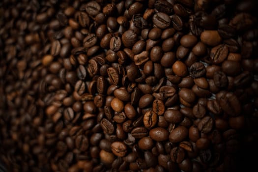 Colorful background with coffee beans in close-up. High quality photo