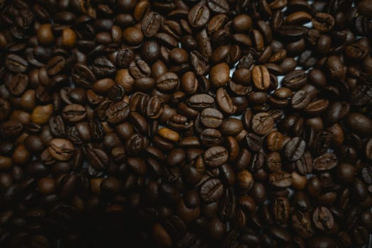 Colorful background with coffee beans in close-up. High quality photo