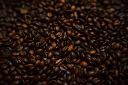 Colorful background with coffee beans in close-up. High quality photo