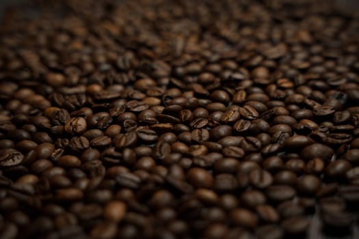 Colorful background with coffee beans in close-up. High quality photo