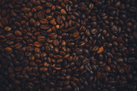 Colorful background with coffee beans in close-up. High quality photo