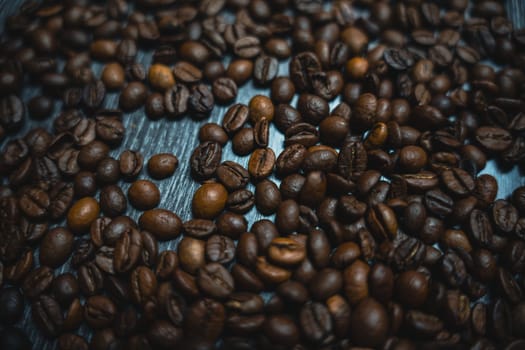 Colorful background with coffee beans in close-up. High quality photo