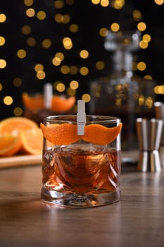 The Sharpie Mustache is a cocktail that's easy to make with equal parts rye whiskey, gin, sweet vermouth and a few drops of bitters, and garnished with a mustache-shaped orange zest