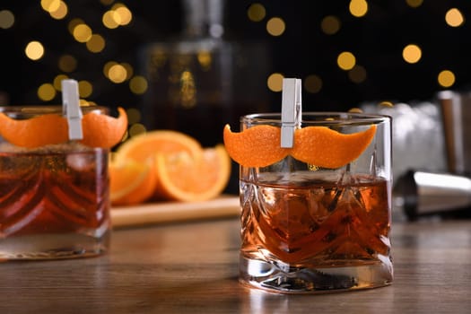 The Sharpie Mustache is a cocktail that's easy to make with equal parts rye whiskey, gin, sweet vermouth and a few drops of bitters, and garnished with a mustache-shaped orange zest