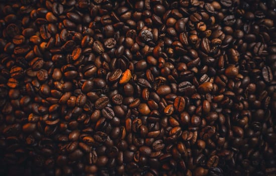 Colorful background with coffee beans in close-up. High quality photo