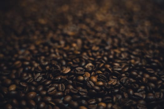 Colorful background with coffee beans in close-up. High quality photo