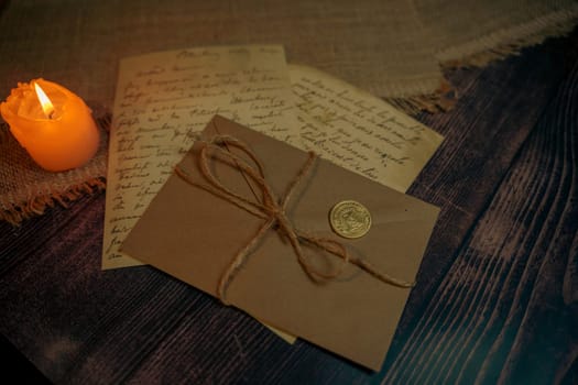 An antique envelope and a letter on the table. High quality photo