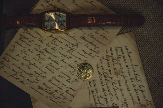 An antique envelope and a letter on the table. High quality photo