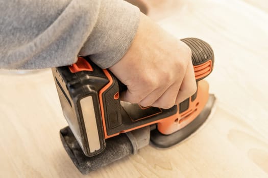 Work with a grinder on wood. Work tool. High quality photo