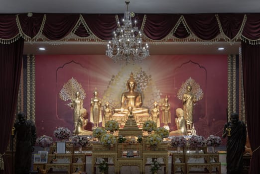 Bangkok, Thailand - May 22, 2024 - The Buddha image or Buddha statue in main monastery at Samphanthawong Saram Worawihan temple (Wat Ko). Space for text, Selective focus.