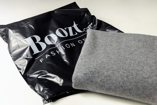 Boozt fashion online shopping. Package from the Boozt store. Denmark - Oktober 25, 2023.