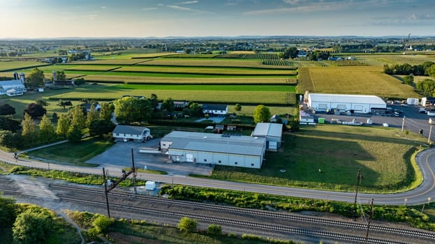 An Aerial View of Industrial and Farmland Area at Sunset