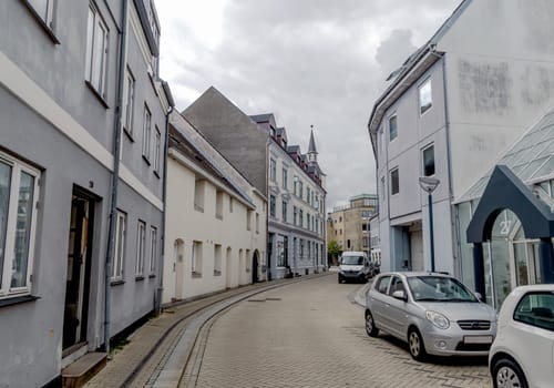 Street of the old Danish town of Aalborg, Denmark - Oktober 1, 2023.