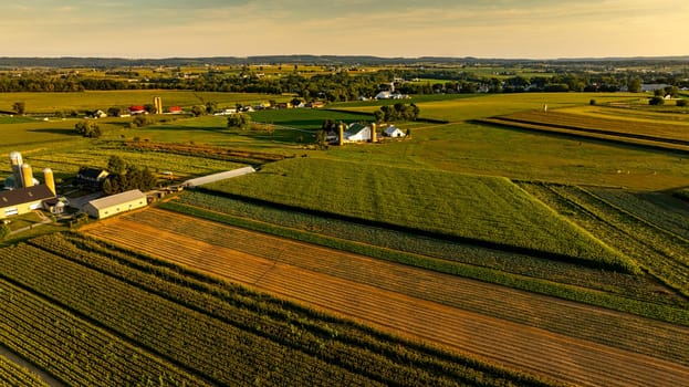 An Aerial View of Rural Farmland and Community at Sunset