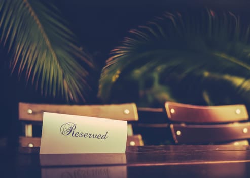 A Reserved Table At A Restaurant In A Tropical Resort Hotel