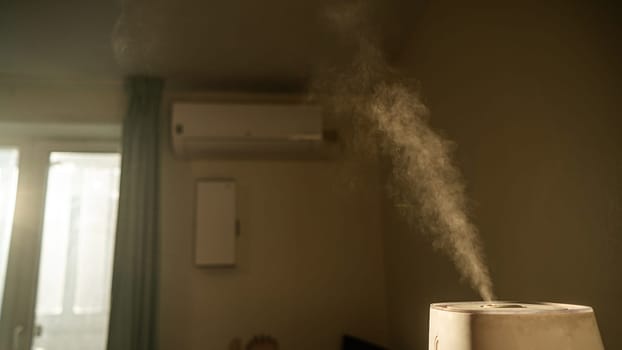 A humidifier evaporates moisture in the bedroom