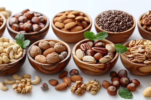 A selection of mixed nuts, including walnuts, displayed in wooden bowls on a table. These natural foods are versatile ingredients for various recipes and dishes