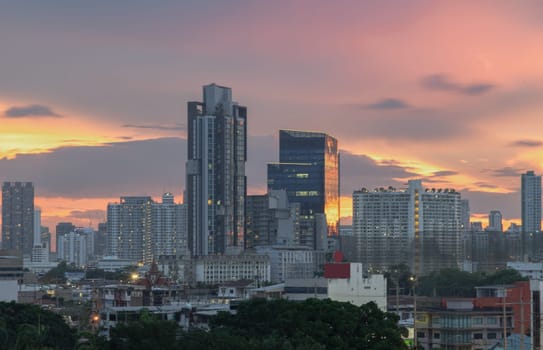 Bangkok, Thailand - May 20, 2024 - Bangkok city skyscrapers after sunset with Beautiful sky background. Gorgeous scenic of sunset with beautiful cloud and sky over metropolitan city, They can be used as Wallpaper, Space for text, Selective Focus.