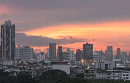 Bangkok, Thailand - May 20, 2024 - Bangkok city skyscrapers after sunset with Beautiful sky background. Gorgeous scenic of sunset with beautiful cloud and sky over metropolitan city, They can be used as Wallpaper, Space for text, Selective Focus.