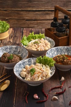 Tasty rice noodles soup with pork and meat ball in ceramic bowl. Asian food.