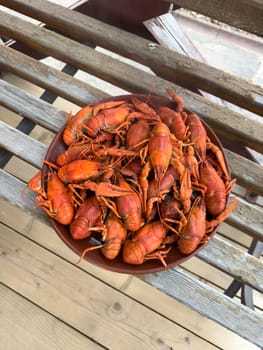 red crayfish lie on a plate