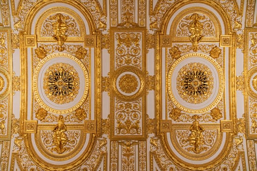 gold-painted ceiling of a room in the Hermitage. photo