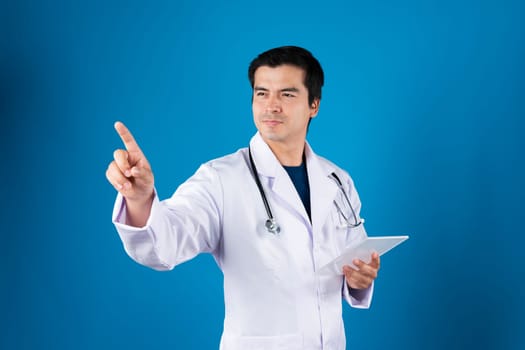 Smart doctor holding transparent tablet searching disease research data with pointing in futuristic technology for remedy therapy healthcare innovation interface hologram monitor screen. Contrivance.