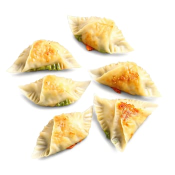 Vegetable gyoza pan fried dumplings with cabbage and carrot filling peeking out isolated on transparent. Food isolated on transparent background.