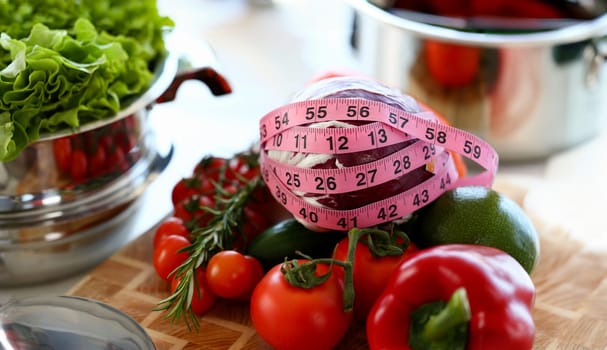 Purple Cabbage Wind Round Measuring Centimetre. Fresh Ripe Tomatoes. Assortment of Organic and Healthy Vegetable Ingredient. Aromatic Rosemary in Kitchen. Vegetarian Food Horizontal Photography