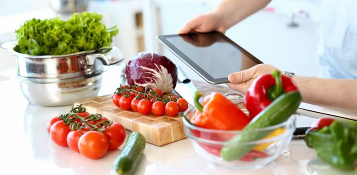 Chef Hands Recording Organic Salad Vegetables. Healthy Recipe Blog. Tomato, Cabbage and Sharp Knife on Cutting Board. Green Cucumber and Pepper in Bowl. Vegetarian Lifestyle Concept Photography