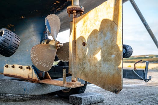 Propeller screw and rudder of vessel at Rosbeg harbour in County Donegal - Ireland