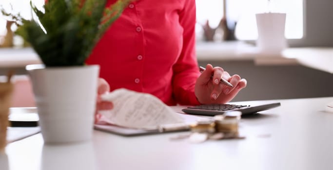 Medic Woman Calculating Medicine Insurance Profit. Female Hand Holding Pen and Using Calculator. Specialist Sitting at Desk with Paperwork. Filling Medical Form. Price for Treatment Therapy Closeup