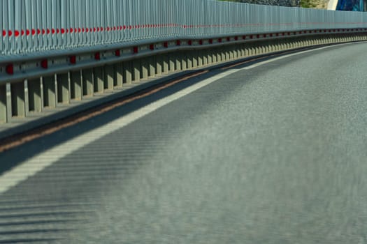 Safety barriers on highway. Anodized safety steel barrier. Enhancing highway safety