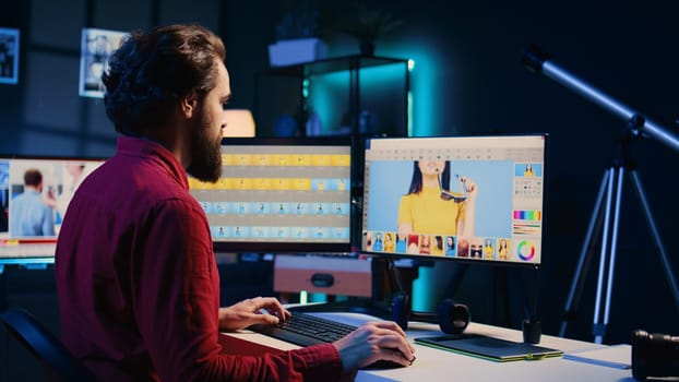 Photographer using software on computer to perform editing operations, correcting images in creative agency. Photo editor using desktop PC tp make adjustments to photographs