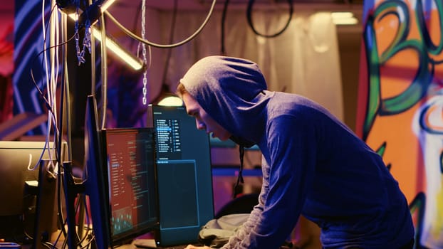 Hackers hearing police sirens while using network vulnerabilities to exploit servers, running to not get caught hacking computer systems at night, escaping law enforcement after breaching networks