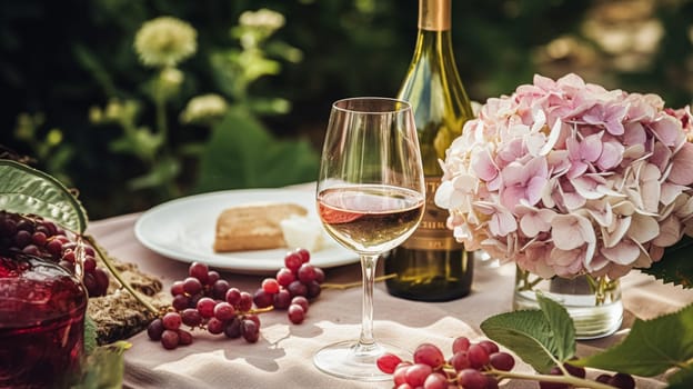 Wedding or formal dinner holiday celebration tablescape with hydrangea flowers in the English countryside garden, table setting and wine, floral table decor for family dinner party, home styling inspiration