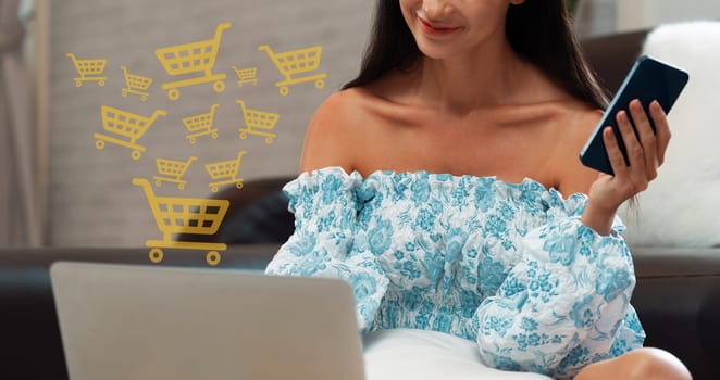 Customer wearing blue dress control device choosing online platform. Smart consumer watching gadget opening e-commerce application using credit card, cashless technology shopping inventory. Cybercash.